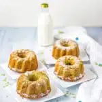 pistachio olive oil cake on ceramic plate