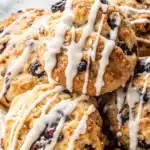 Freshly baked blueberry biscuits on kitchen counter