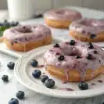 Freshly glazed blueberry donuts