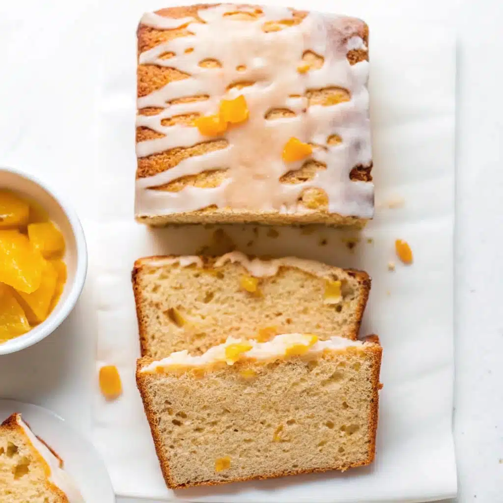 Freshly sliced peach bread loaf with golden crust