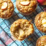 fresh apple oatmeal muffins close up on wooden table